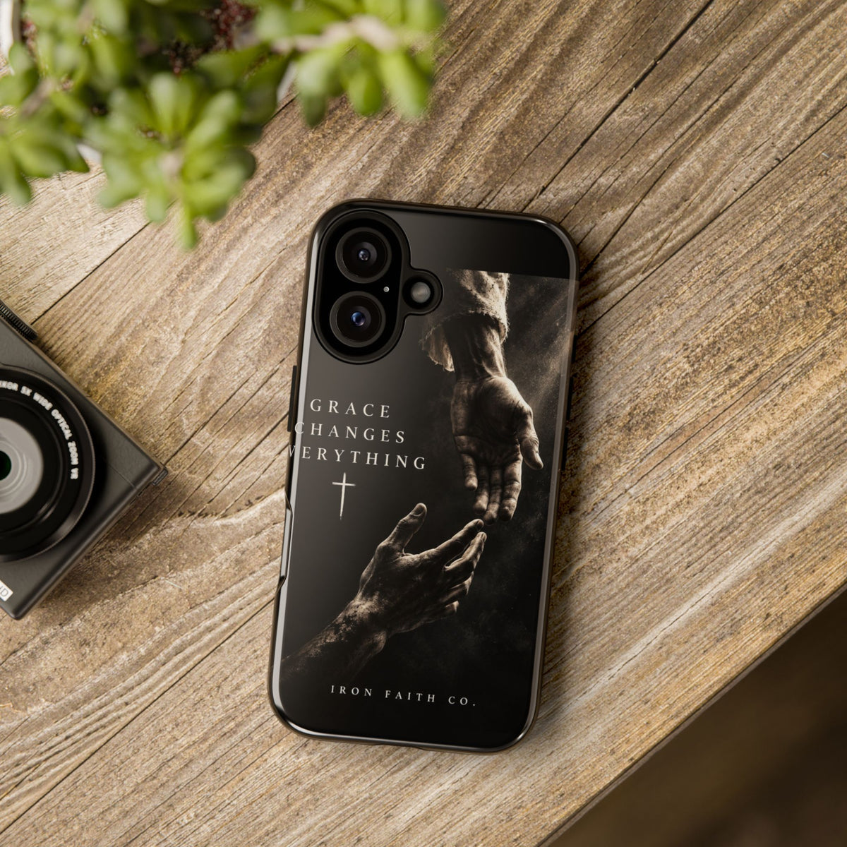 The Grace Changes Everything Phone Case shown in a styled everyday scene (product mockup)