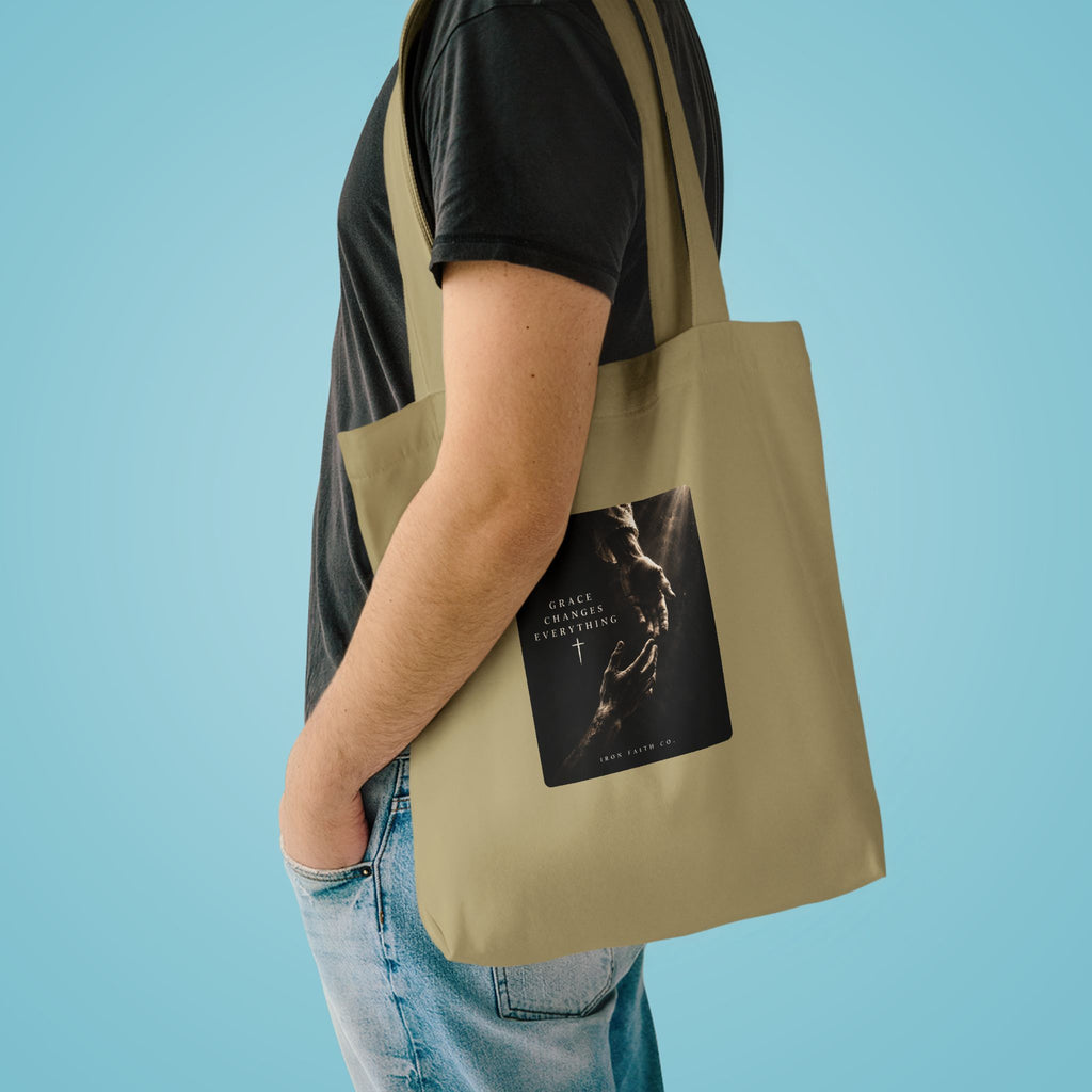 The Grace Changes Everything Tote Bag shown in a styled everyday scene (product mockup)