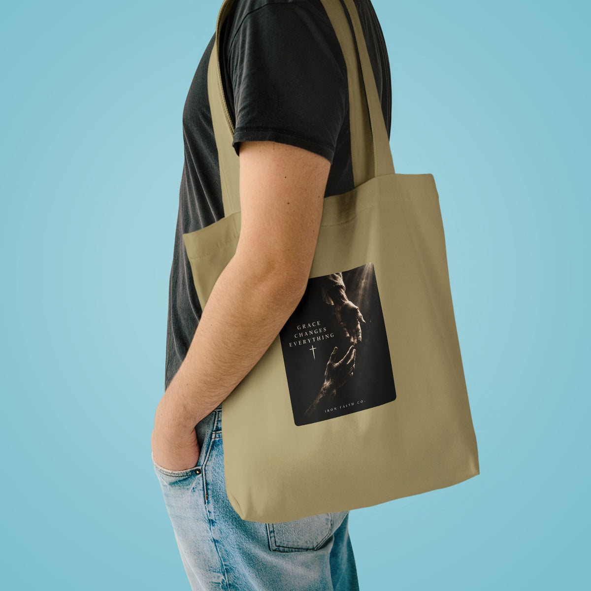 The Grace Changes Everything Tote Bag shown in a styled everyday scene (product mockup)