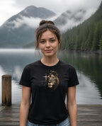 Fictional model wearing the Lion of Judah Women's Fitted Tee in Black, Pacific Northwest scene (digitally composited lifestyle image)