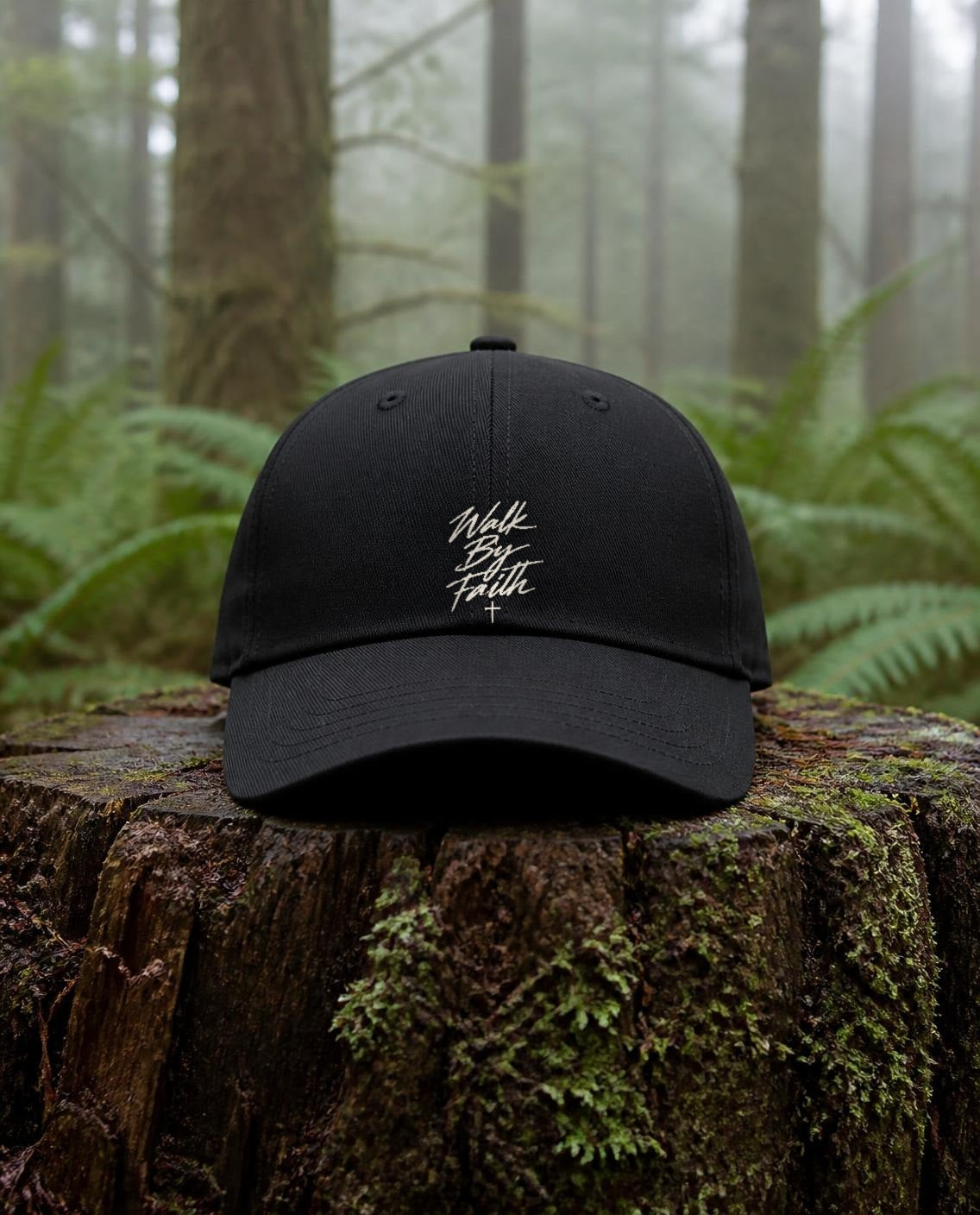 Walk By Faith Dad Hat in Black shown outdoors (digitally composited lifestyle image)